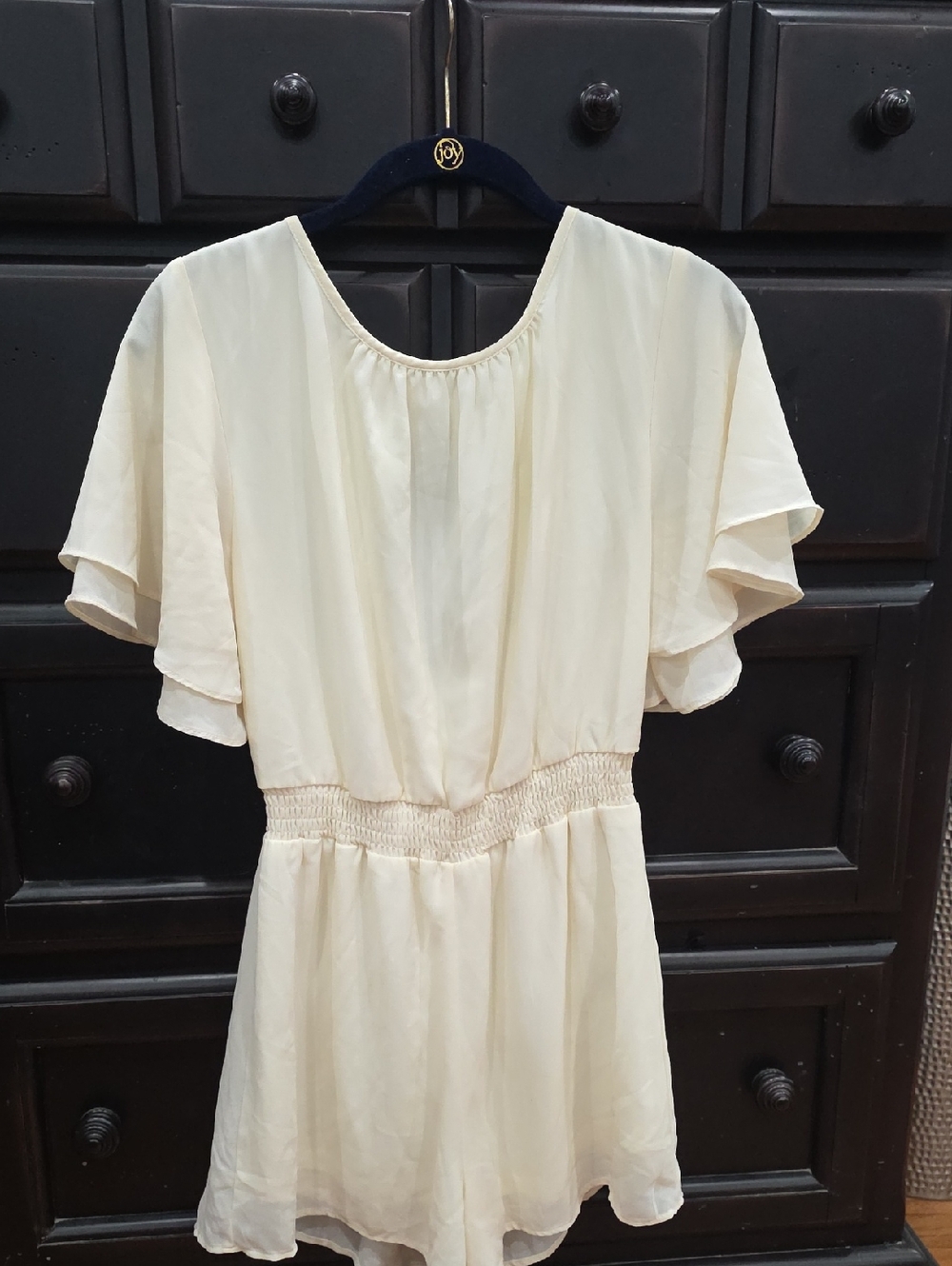 She + Sky Cream Flutter Sleeve Smocked Waist Romper
